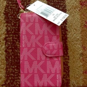 Brand new Michael Kors wristlet/phone case